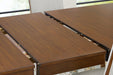 Lyncott Dining Extension Table - Inland Furniture (San Bernardino, CA)