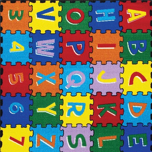 Abbey Alphabet/Multi 4' 9" X 6' 9" Area Rug - Inland Furniture (San Bernardino, CA)