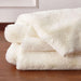 Caparica Off White Throw, Off White - Inland Furniture (San Bernardino, CA)