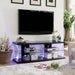 Ernst Black/Clear 60" TV Stand - Inland Furniture (San Bernardino, CA)