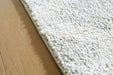 Unawick Large Rug - Inland Furniture (San Bernardino, CA)
