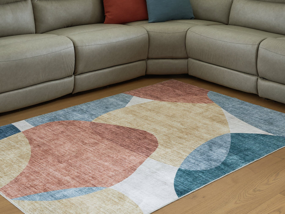 Chanleigh Washable 5' x 7' Area Rug - Inland Furniture (San Bernardino, CA)