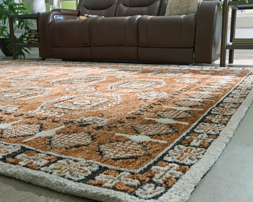 Qaabiz Area Rug - Inland Furniture (San Bernardino, CA)