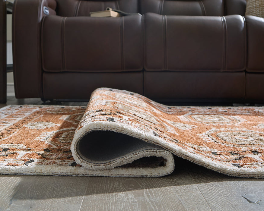Qaabiz Area Rug - Inland Furniture (San Bernardino, CA)