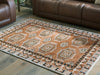 Qaabiz Area Rug - Inland Furniture (San Bernardino, CA)