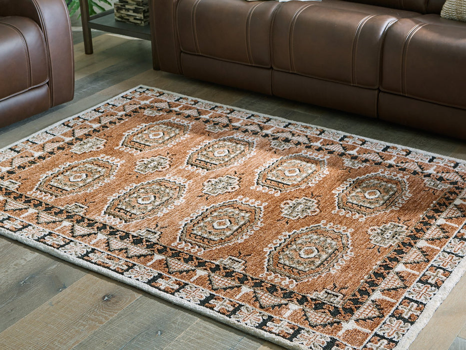 Qaabiz Area Rug - Inland Furniture (San Bernardino, CA)