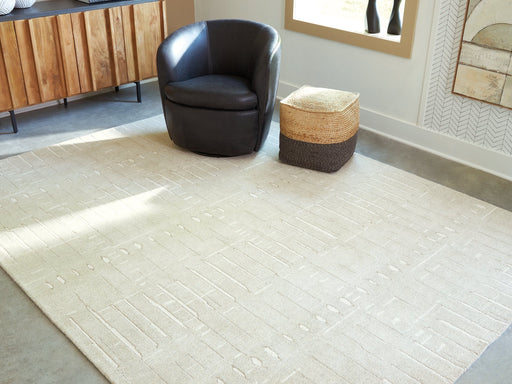 Wolbert 7'8" x 10' Area Rug - Inland Furniture (San Bernardino, CA)
